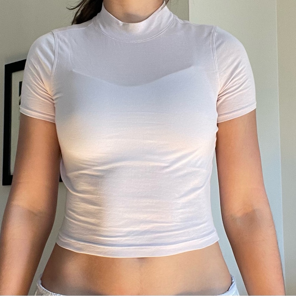 a light pink lulu lemon athletic t-shirt